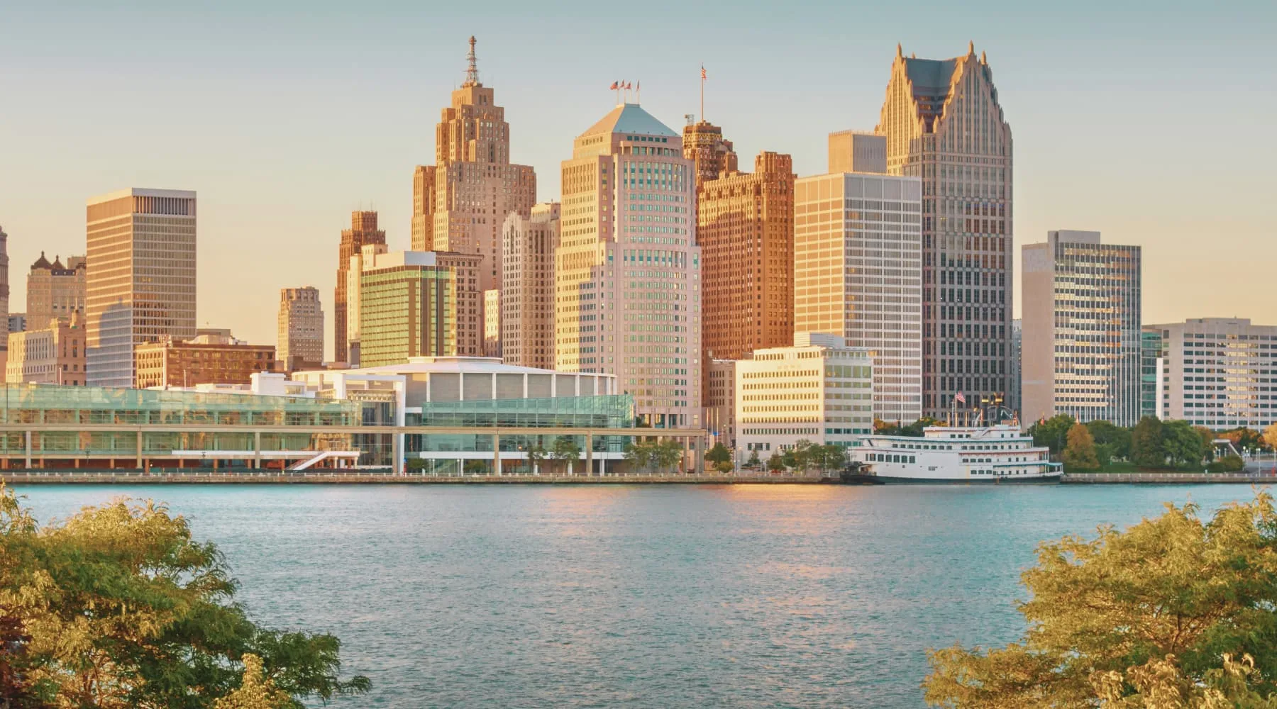 Downtown Detroit skyline and waterfront at sunset