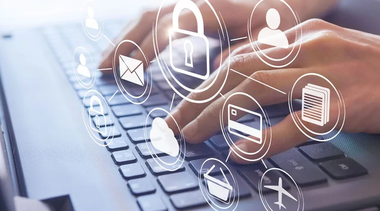 Image of person typing on keyboard.