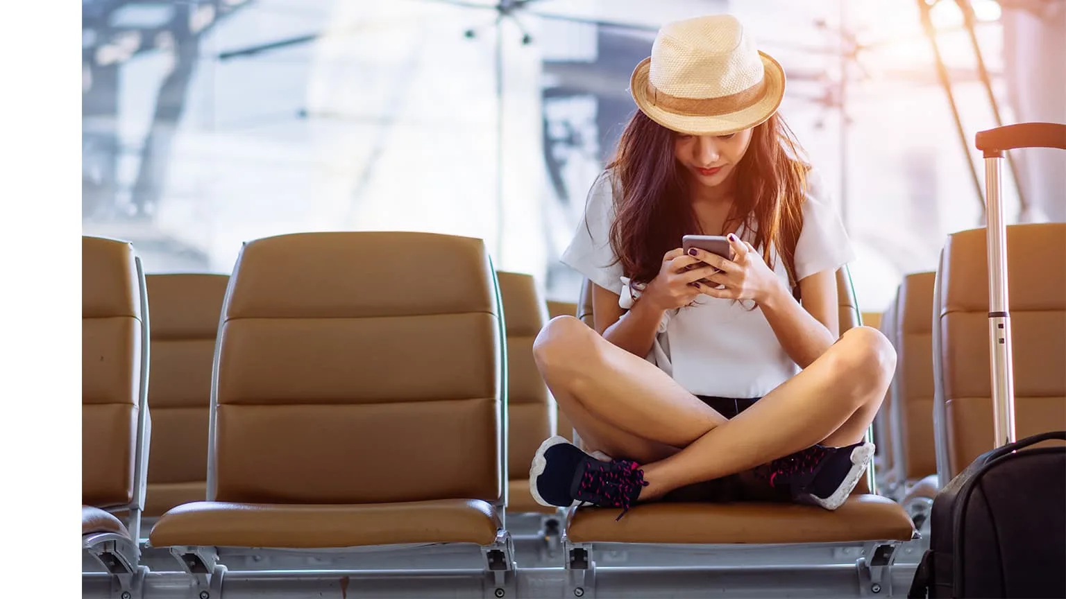 woman sitting on an airport